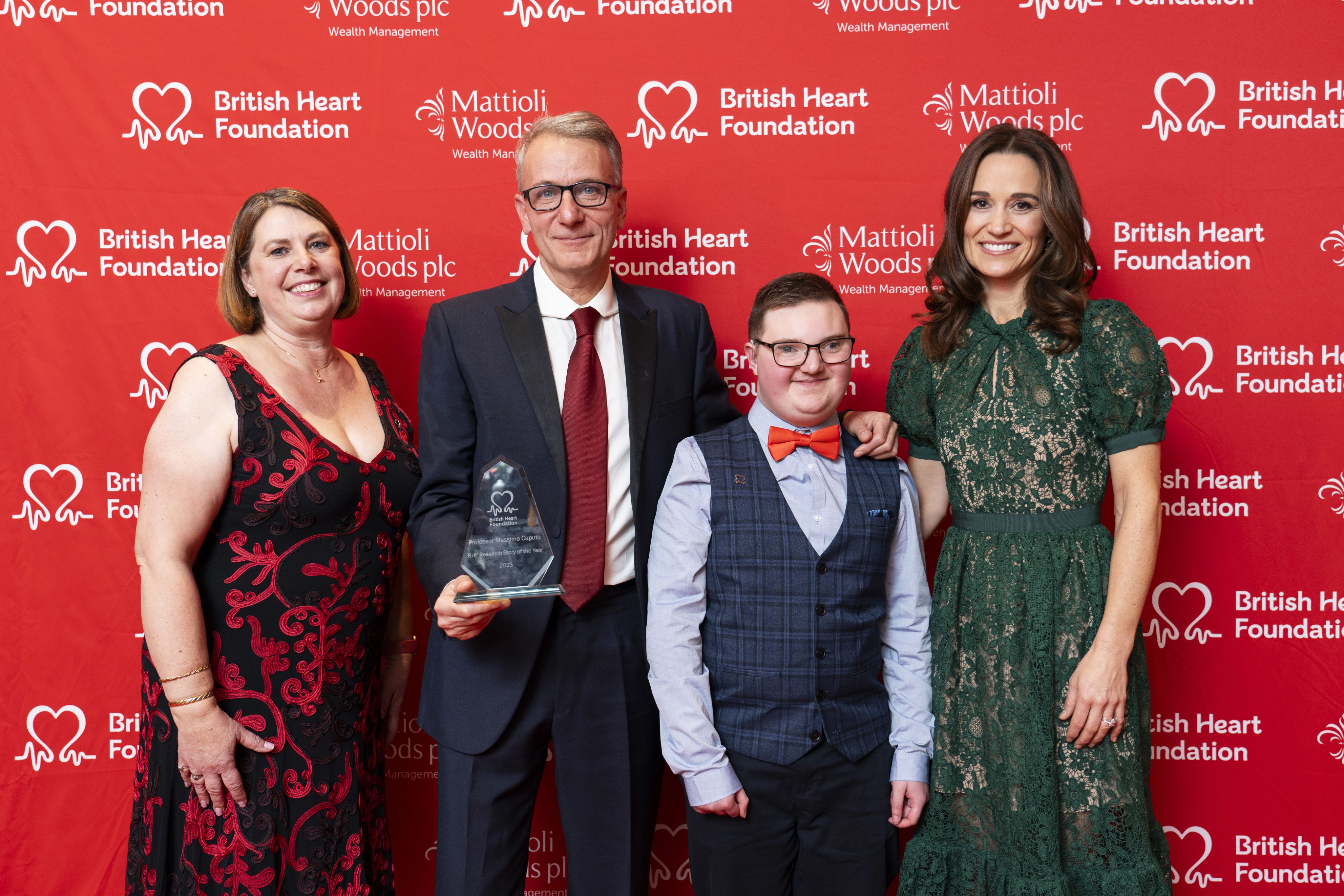 Professor Caputo with his BHF Heart Hero award, one of his previous patients and mother, with Pippa Middleton