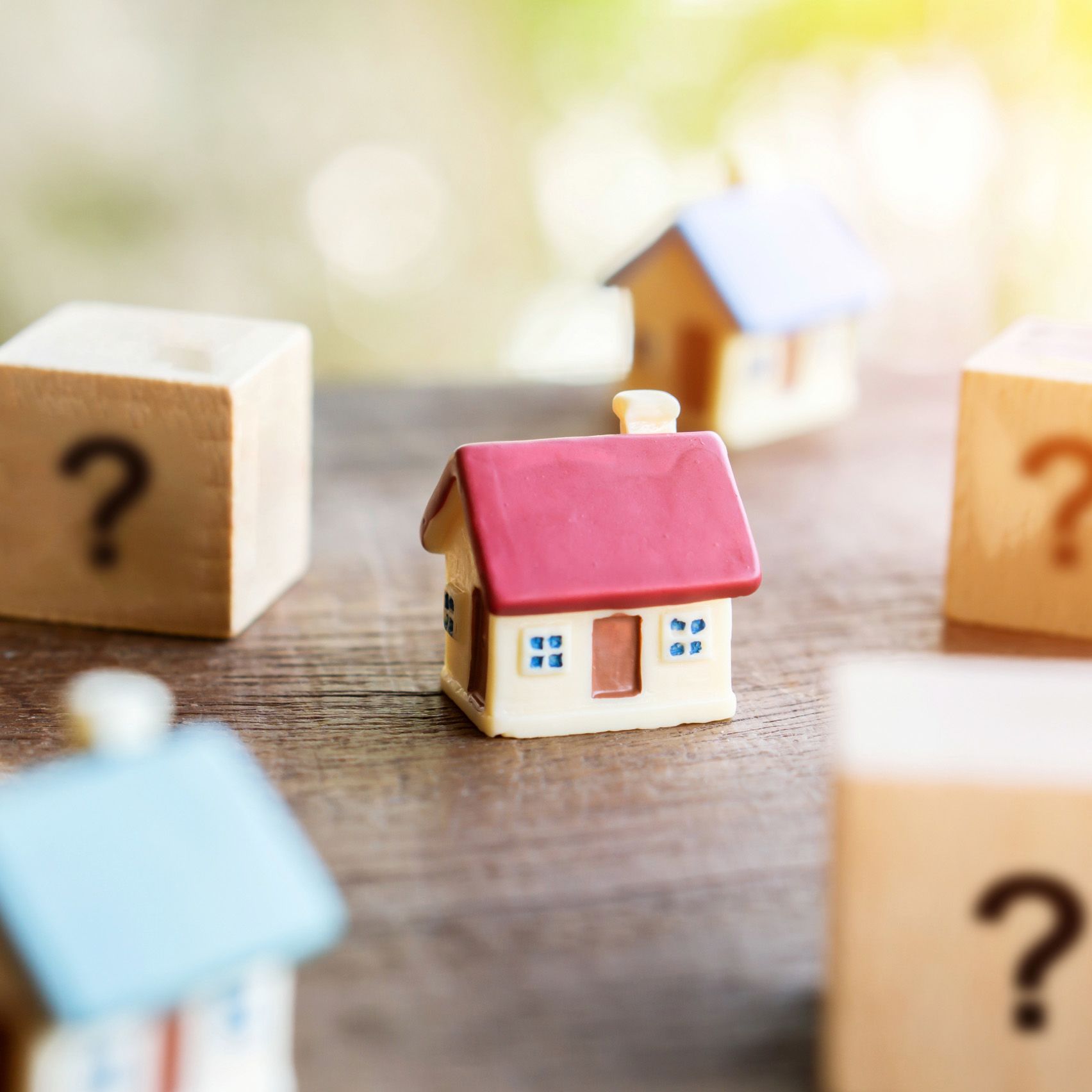 Illustration of a house with question marks