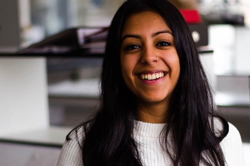 Image of woman smiling at camera