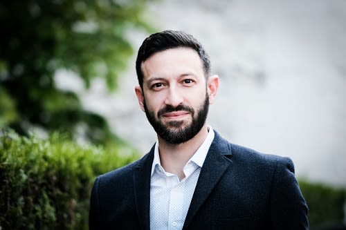 Head shot of Professor Michele Acuto in suit.